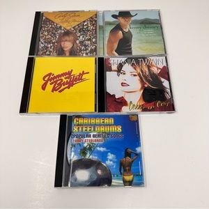 Bundle of 5 CD’s Carly Simon, Kenny Chesney, Jimmy Buffet, Shania, Steel Drums